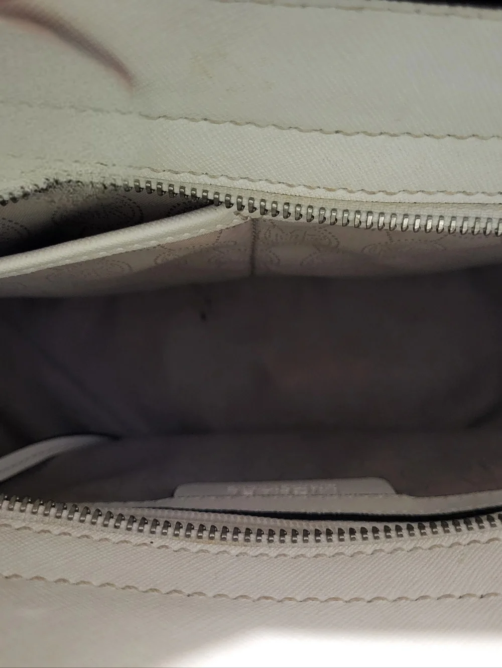 Michael Kors White Leather Satchel with Silver Metal Grommets.